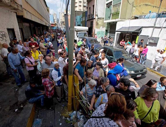 Venezuelans line up to buy price-controlled toilet paper